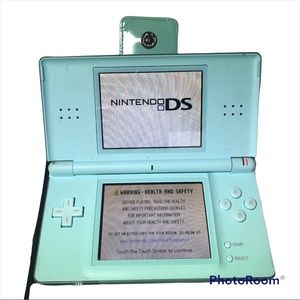 Nintendo FS lite ice blue with 2 games. Working , no charger